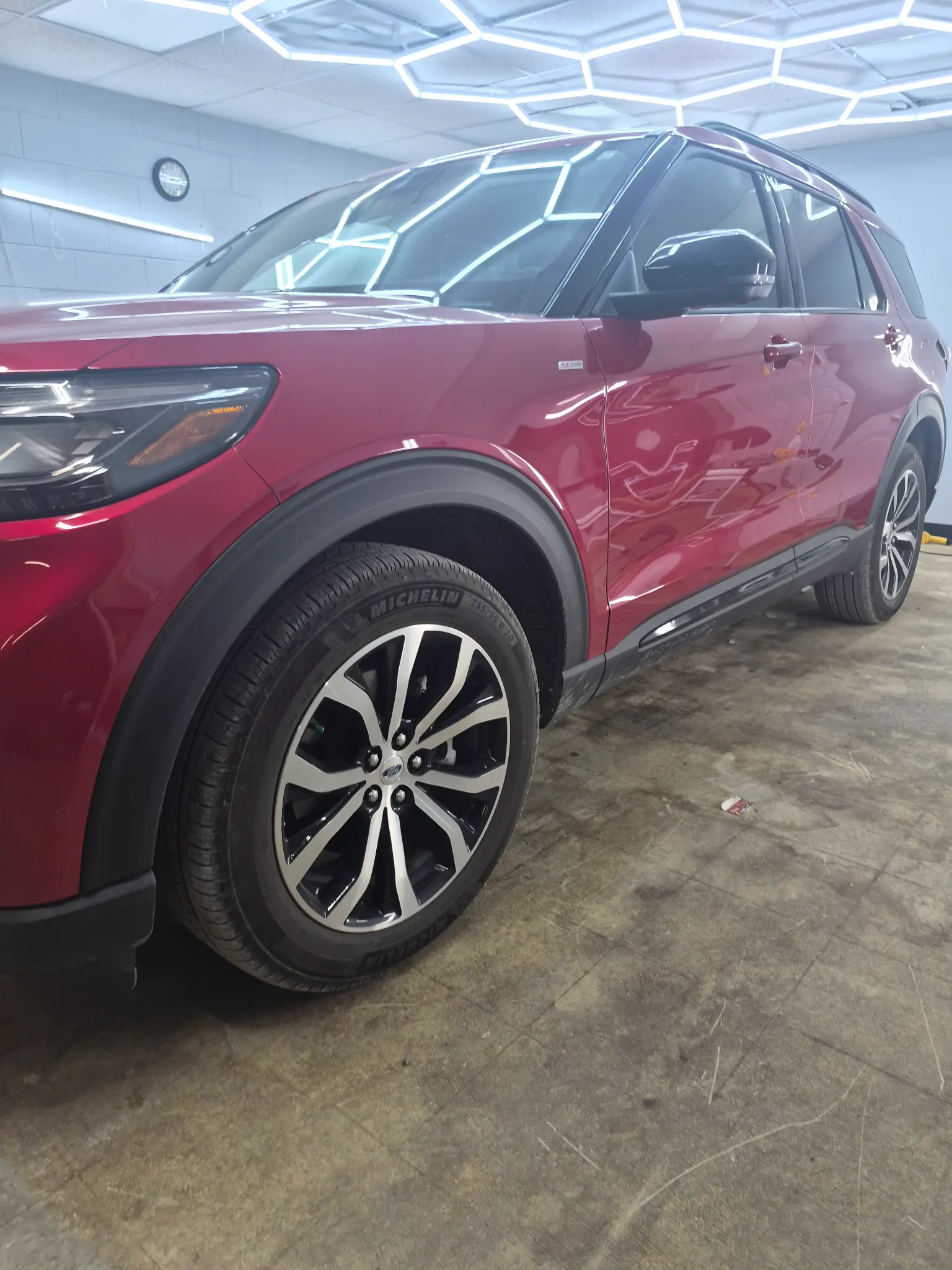 Protection prep and install detail on a Customer vehicle during film-focused service